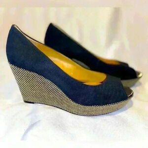 Nine West | Cheerful | Platform Wedge |
Navy Blue Canvas | Peep Toe